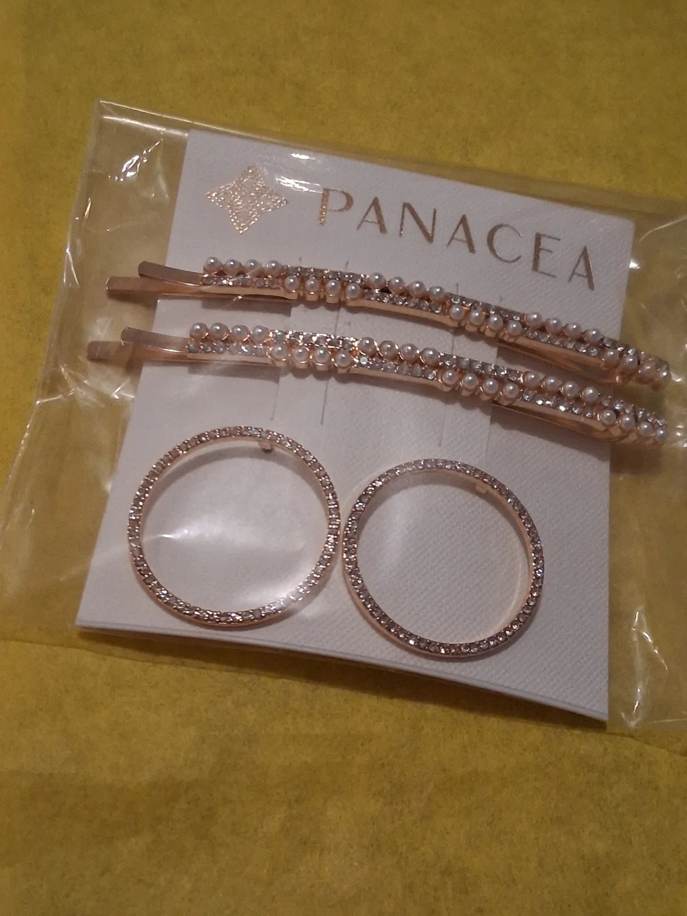 Panacea Cache Rose Gold Pearl Hair Pins and Crystal Hoop Earrings.